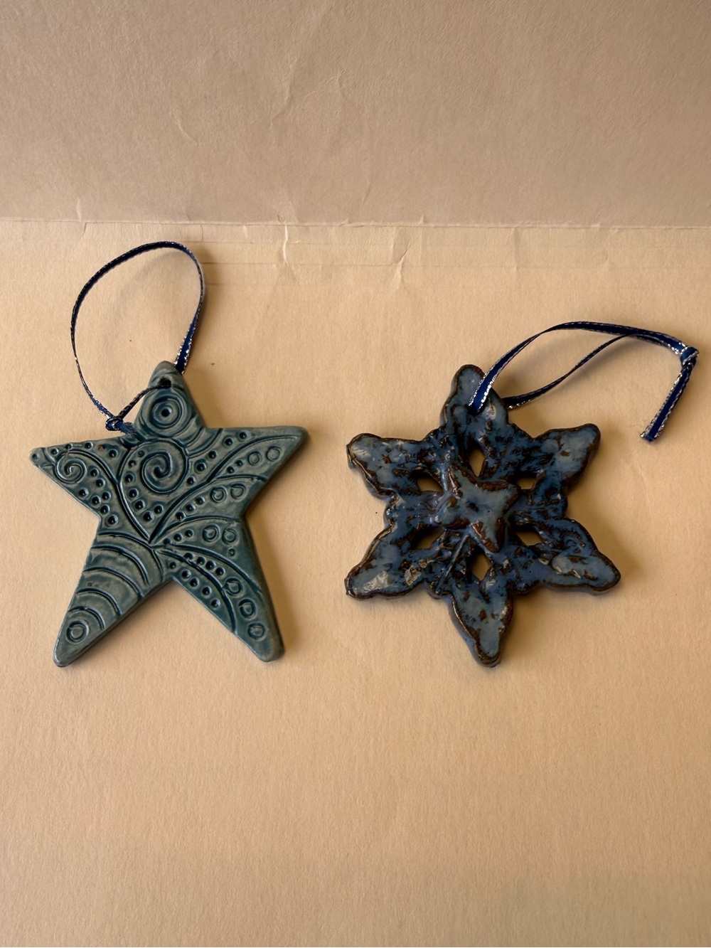 2 Handcrafted Blue Ceramic Holiday Star and Snowflake Ornaments.